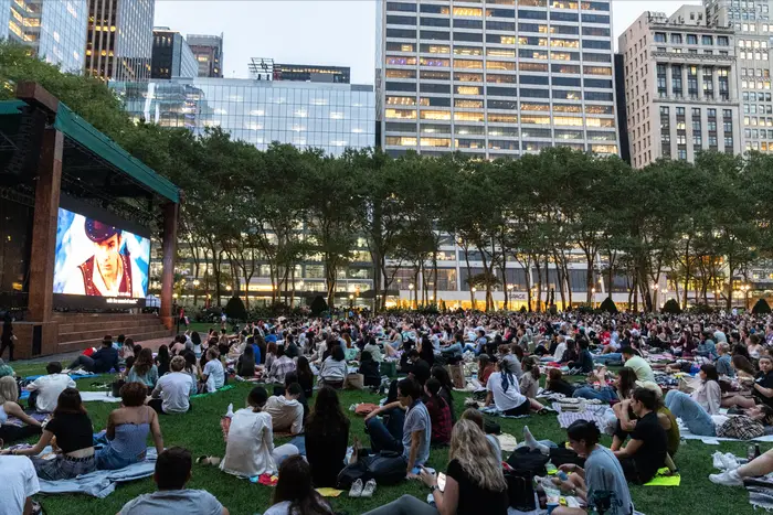 A photo of people watching a film at Bryant Park Movie Nights